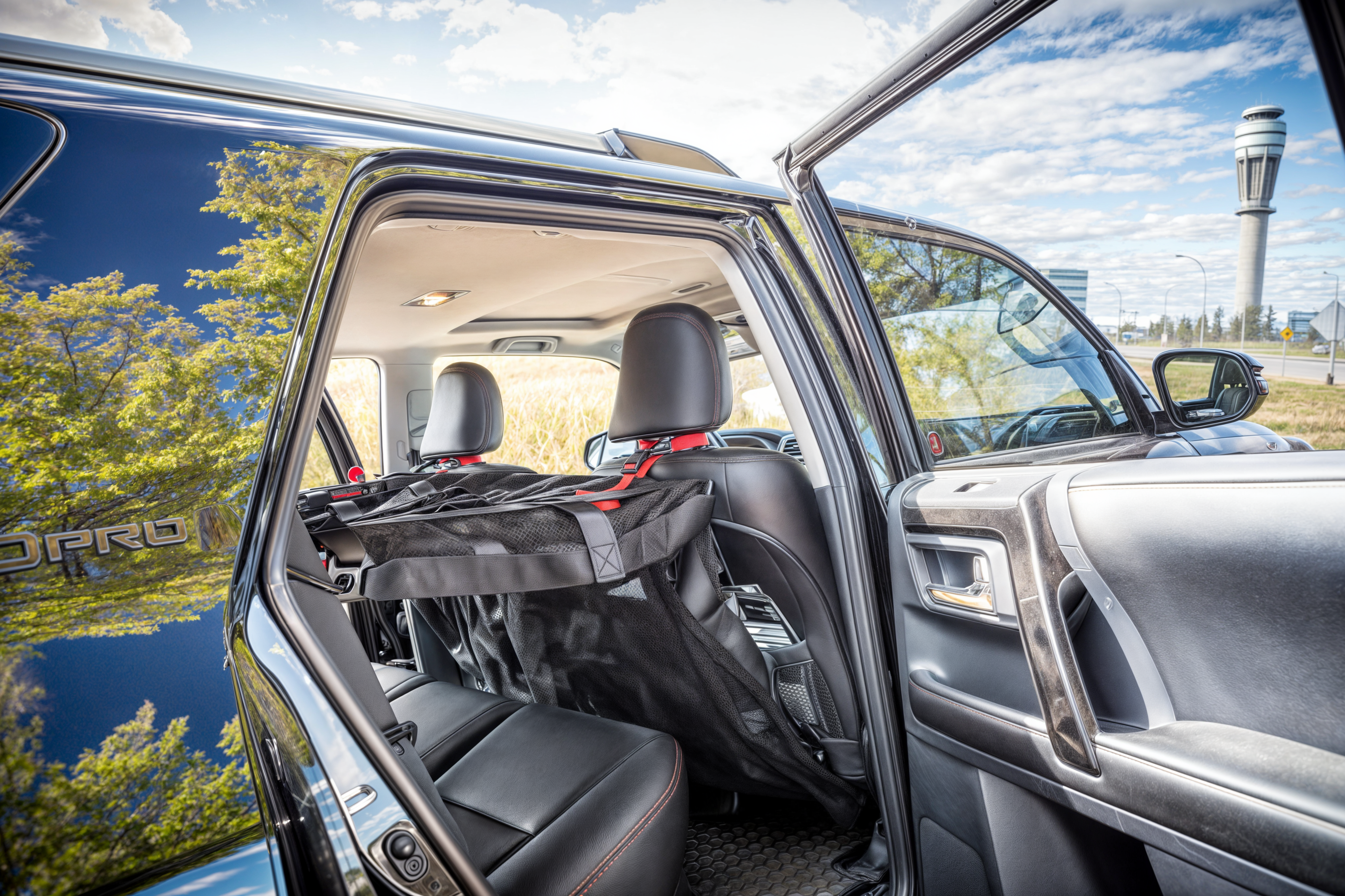 QAB-IRN Interior Cargo Barrier side view installation in vehicle interior